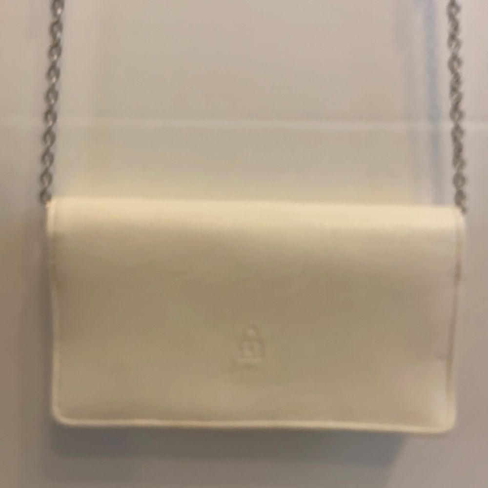 Safe keeper crossbody 7.5”x4” cream color‎